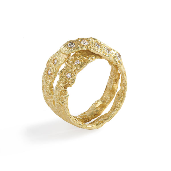 Colibri' Diamonds Ring by Emanuela Duca - The Colibri' ring in 18k yellow gold presents a distinctive setting for five white diamonds (2mm) and four white diamonds (1.5mm). True to Emanuela Duca's signature style, each line and element within the design offers surprises with its spontaneous appearance. This statement piece carries an essence of ancient allure and vibrant contemporaneity. • White diamonds, cts 0.0801; 18k yellow gold