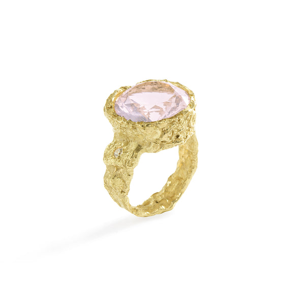Colibri' Rose Quartz Ring by Emanuela Duca - The Colibri' ring, crafted in textured 18k yellow gold, showcases a stunning 12mm rose quartz stone paired with a diamond (2mm). The beautiful romantic rose color of the stone complements the warmth of the gold. This piece adds a romantic spark to your look. • Rose Quartz, diamond, 18k yellow gold