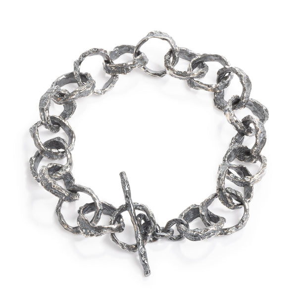Raw You Links Bracelet by Emanuela Duca - Crafted from highly textured blackened sterling silver links, this piece exudes uniqueness and raw elegance. With its modern edge, it's the perfect accessory for everyday life.