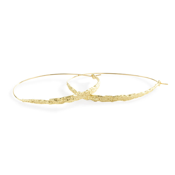 Colibri' Half Moon Hoop Earrings by Emanuela Duca - The Colibri' earrings in 18k yellow gold feature a half-moon hoop design, offering a modern and playful twist. • 18k yellow gold • Diameter: 2"