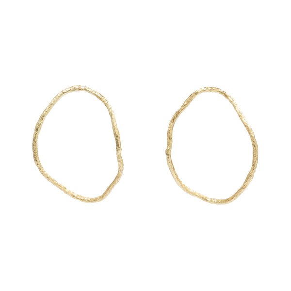 Good Vibes Gold Hoops by Emanuela Duca - Crafted in textured 18K yellow gold, these earrings offer an alternative to traditional hoops. Featuring a design with a post perpendicular to the hoop, they showcase the entirety of the hoop for a distinctive look. Diameter: 1.85 inches.