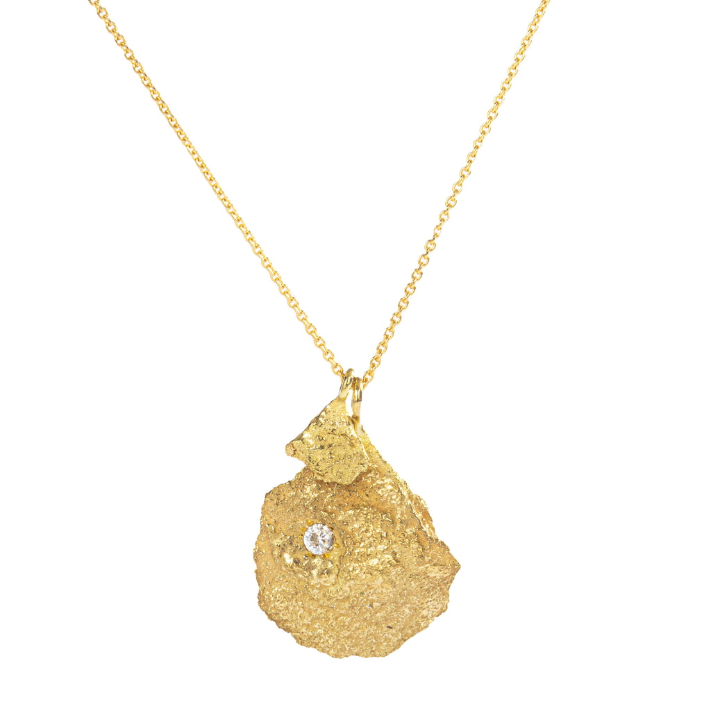 The Spark & Soul necklace features two different pendants in 18k yellow gold, each adorned with a diamond, all held by an 18-inch thin chain. This playful design is perfect for everyday wear and can be worn alone or layered with other necklaces.  • 18k yellow gold, diamond 0.10 cts  • Chain length: 18"