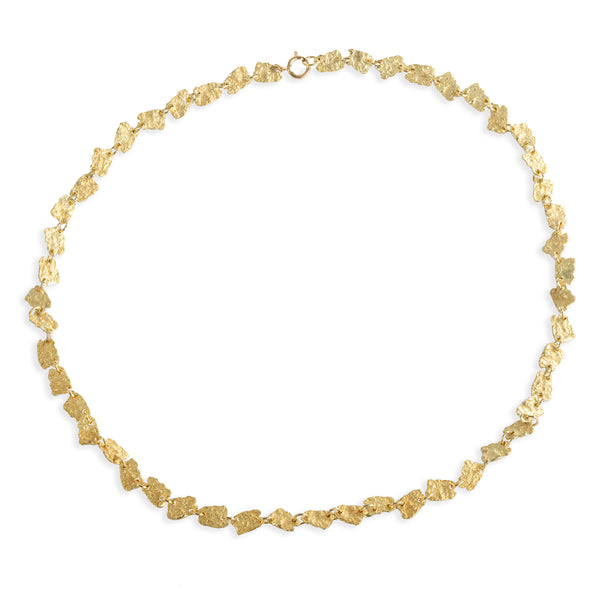 As the textured 18k yellow gold pieces come together to form the November's Moon necklace, they create a harmonious composition that evokes a sense of beauty and sophistication. Whether worn for a special occasion or as an everyday statement piece, the November's Moon necklace is sure to capture attention and inspire admiration for its exquisite craftsmanship and timeless charm.&nbsp;  • Length: 16.5"