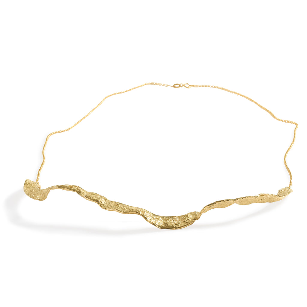 Colibri' Necklace by Emanuela Duca - Celebrate femininity and boldness with our Colibri' necklace. Crafted in 9k yellow gold, its organic and bold design is contrasted by a delicate 18k yellow gold chain. This piece exudes individuality and uniqueness. • 9k yellow gold; 18k yellow gold • Length: 16 inches