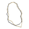 The Mystic Gold & Black Bars Necklace by Emanuela Duca - A fusion of textured blackened sterling silver and 18k yellow gold. With a classic flair, this piece embodies timeless elegance and sophistication.