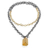 Raw You Golden Beryl Stone Necklace by Emanuela Duca - This statement necklace is a versatile fusion of 18k yellow gold and blackened sterling silver. Wear it long or doubled for added flair. Adorned with an asymmetrical golden beryl stone, it embodies elegance with a touch of modernity. Length: 43 inches. One of a kind.