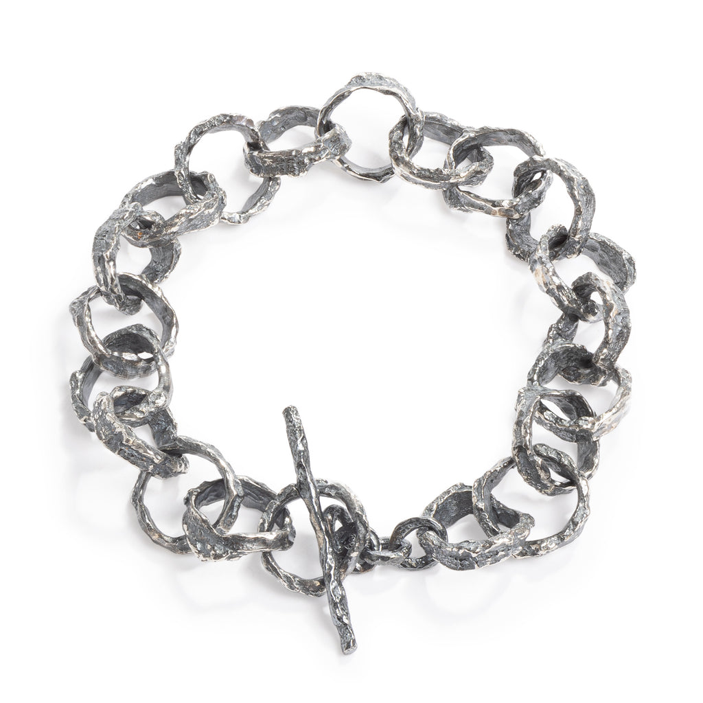 Raw You Links Bracelet by Emanuela Duca - Crafted from highly textured blackened sterling silver links, this piece exudes uniqueness and raw elegance. With its modern edge, it's the perfect accessory for everyday life.
