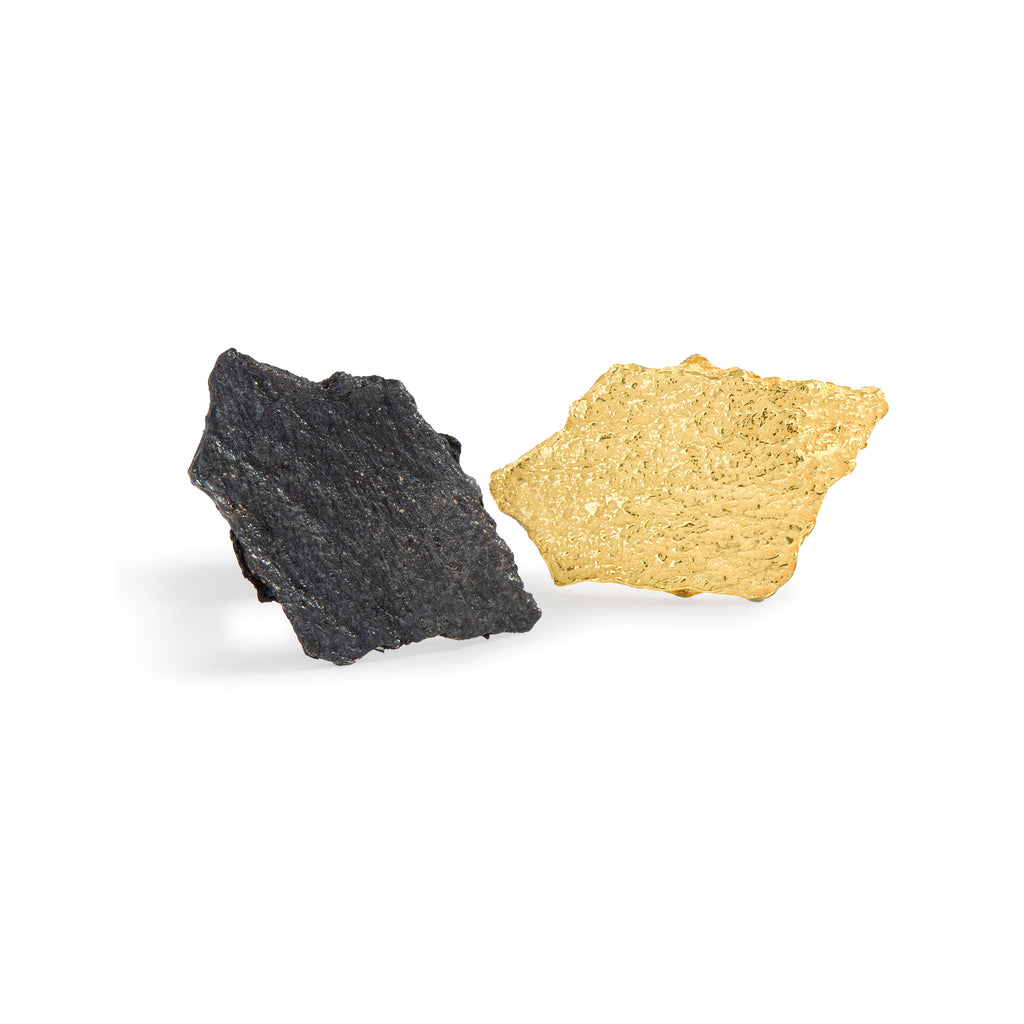 The Mystic Black & Gold Stud Earrings  by Emanuela Duca - Presenting the Mystic stud earrings, a testament to refined elegance and contemporary allure. Offering one earring in 18k yellow gold and one in blackened sterling silver, these earrings embody a unique design that speaks volumes of originality and strength. With their understated yet captivating aesthetic, they effortlessly elevate any ensemble, leaving an impression of sophistication and mystery. 