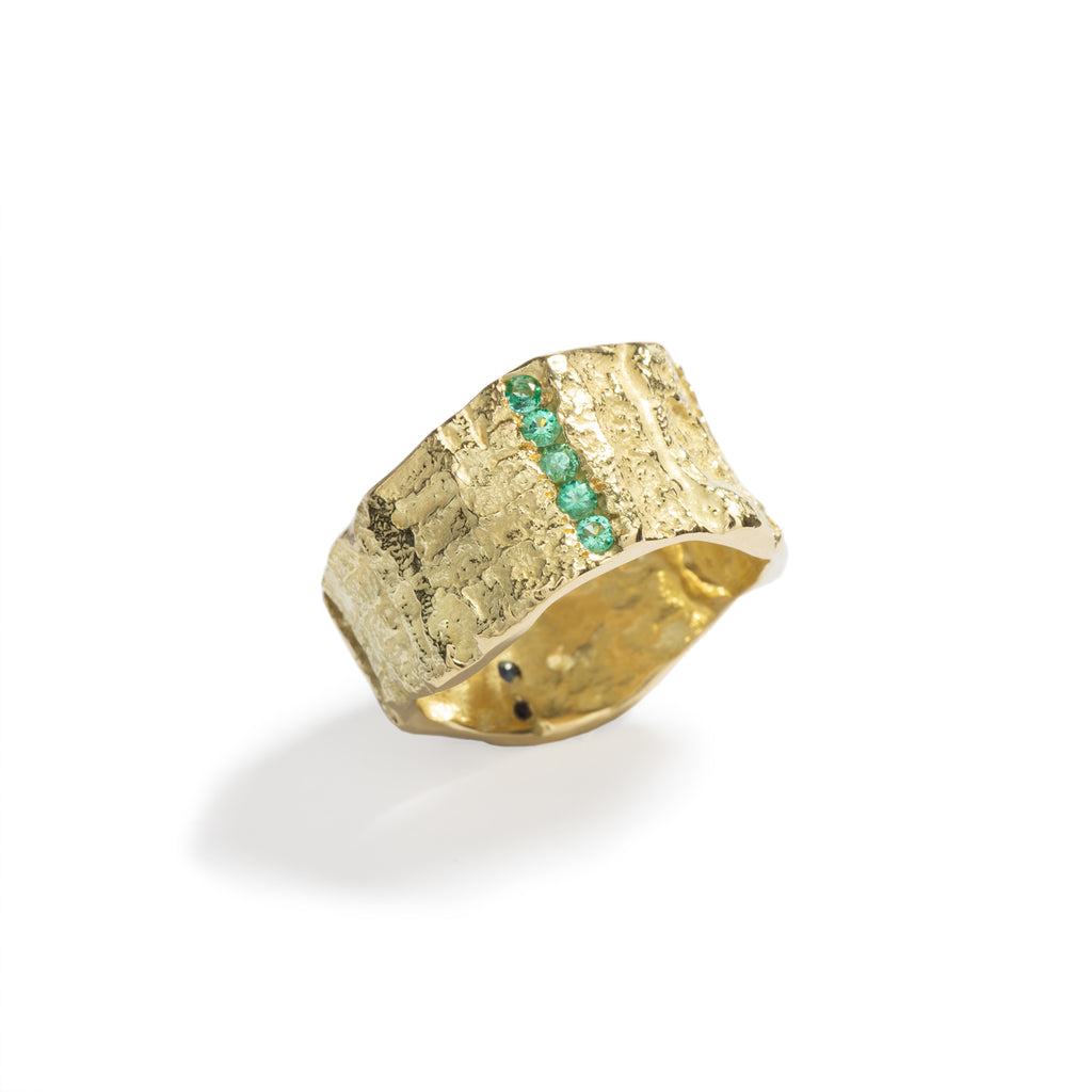 Good Vibes Textured Gold Ring by Emanuela Duca - Crafted in textured 18K yellow gold, it showcases five emeralds (1.7mm) and five blue sapphires (1.7mm). Radiating with Good Vibes and positivity, this ring is a statement piece that adds elegance and color to any occasion, with a hint of edgy flair.
