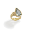 Good Vibes Aquamarine Ring by Emanuela Duca - Crafted in textured 18K yellow gold, it showcases a beautiful off-center aquamarine stone accompanied by a petite diamond. Radiating with Good Vibes and positivity, this ring is a statement piece that adds elegance and a light blue pop of color, embodying the energy of spring and summer with a touch of flare.