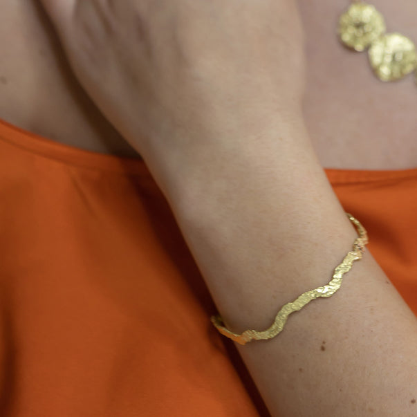 Sunshine Wavy 18k Gold Bangle by Emanuela Duca. Sculptural Fine Jewelry Handcrafted in 18k, Sterling Silver, Bronze, diamonds, and precious gems - Made in Rome & New York